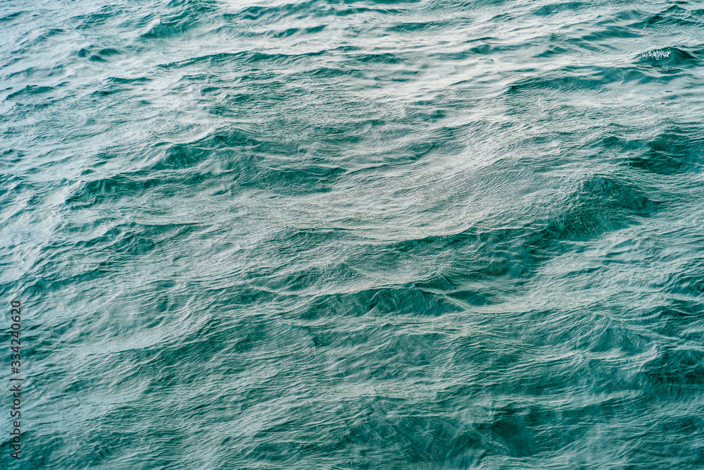 Seething atlantic sea water with foam, jet, stream Cape Cod