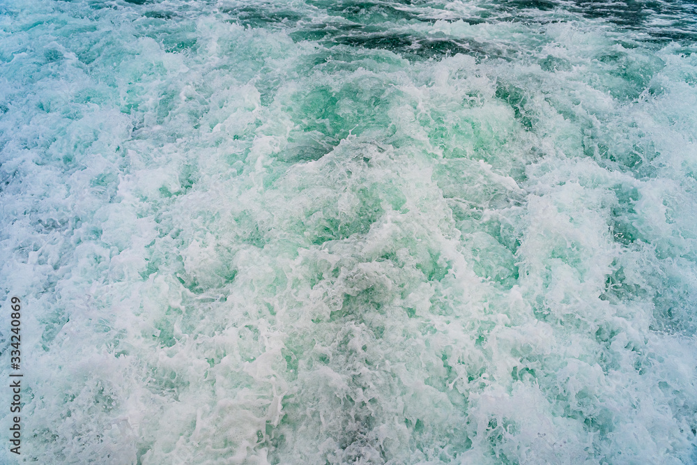 Seething atlantic sea water with foam, jet, stream Cape Cod