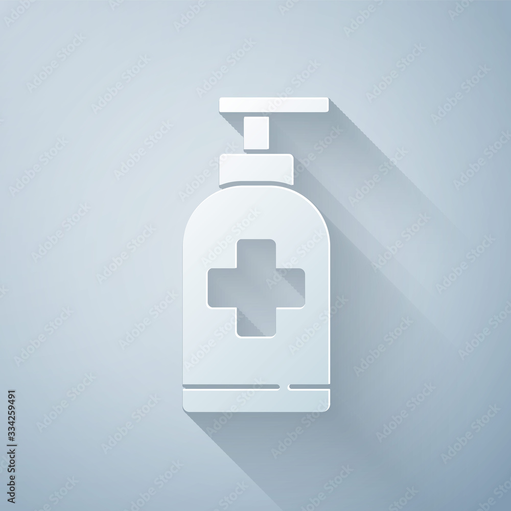 Paper cut Bottle of liquid antibacterial soap with dispenser icon isolated on grey background. Antis