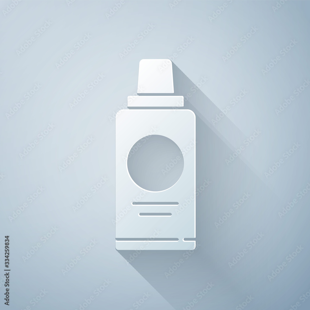 Paper cut Bottle of shampoo icon isolated on grey background. Paper art style. Vector Illustration