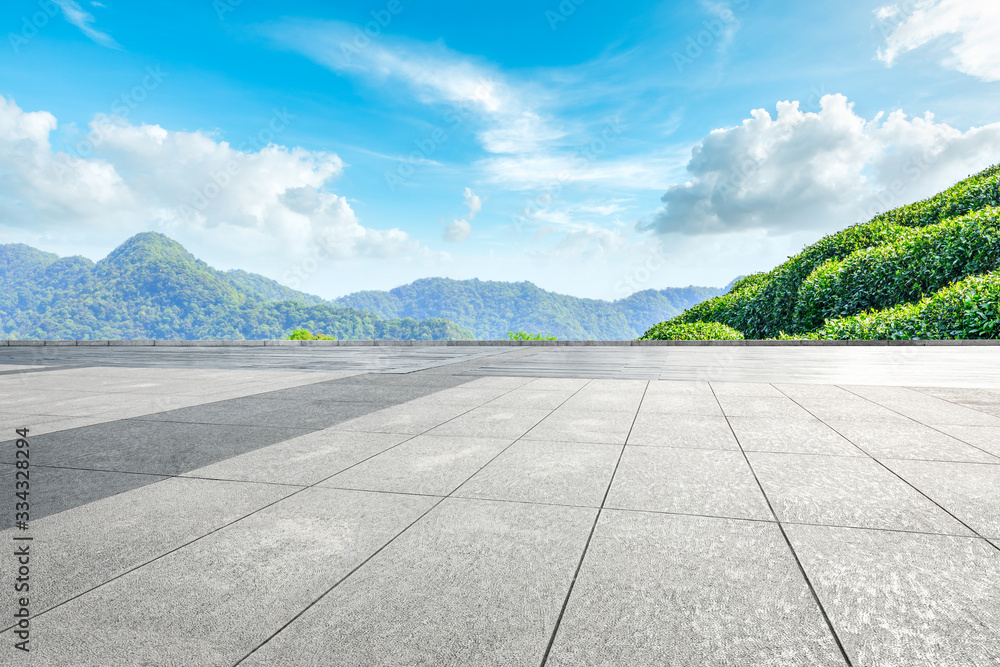 Empty square floor and green tea plantation nature landscape.