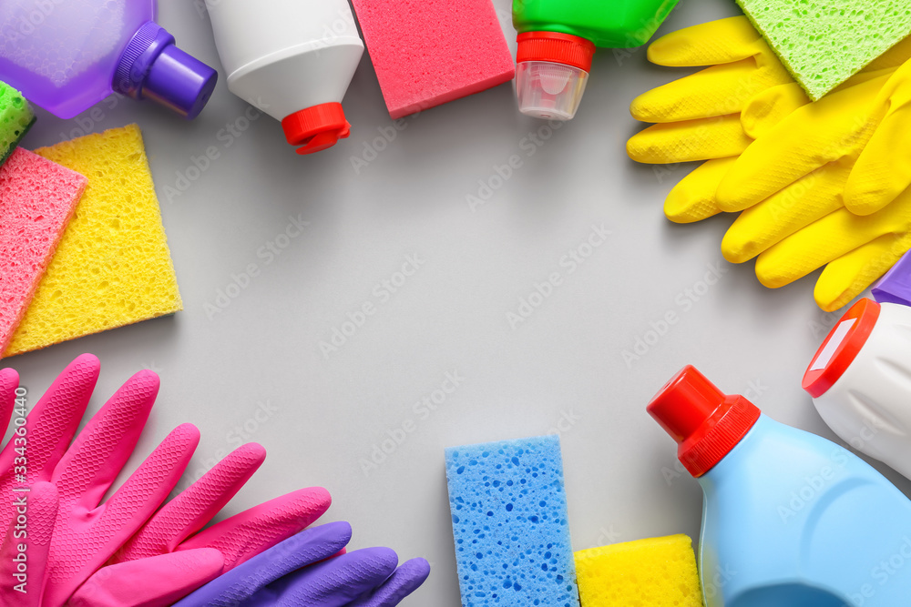 Set of cleaning supplies on light background