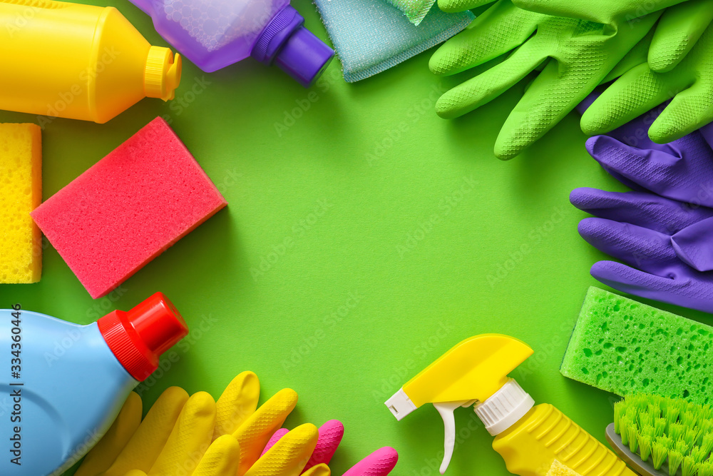 Set of cleaning supplies on color background