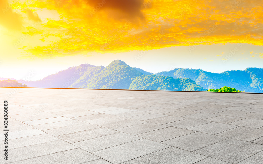 Empty square floor and green tea plantation nature landscape at sunset.