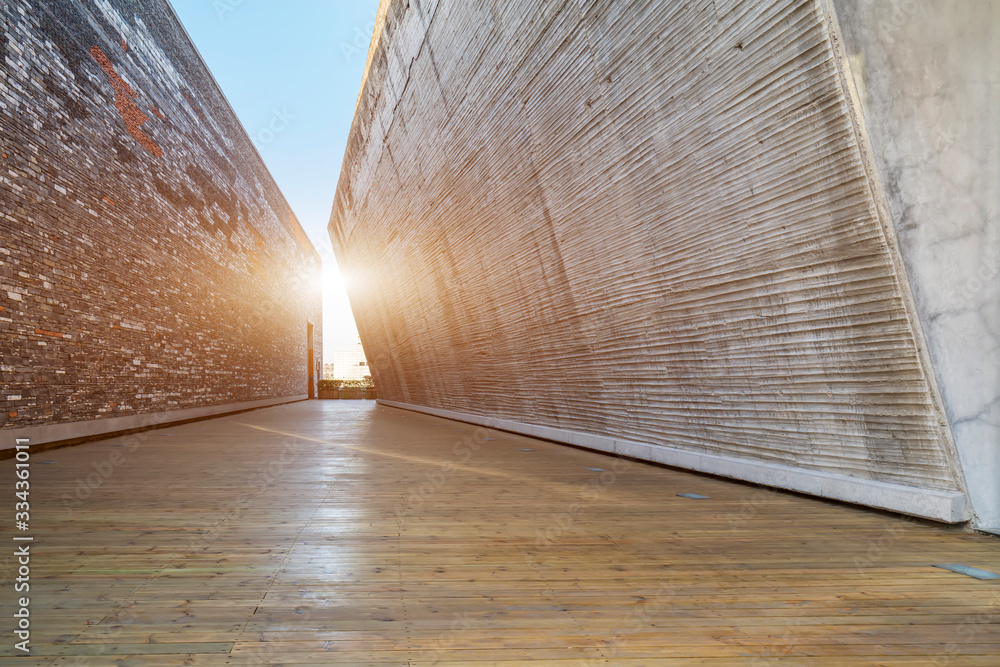 Stone wall, wood floor and light..