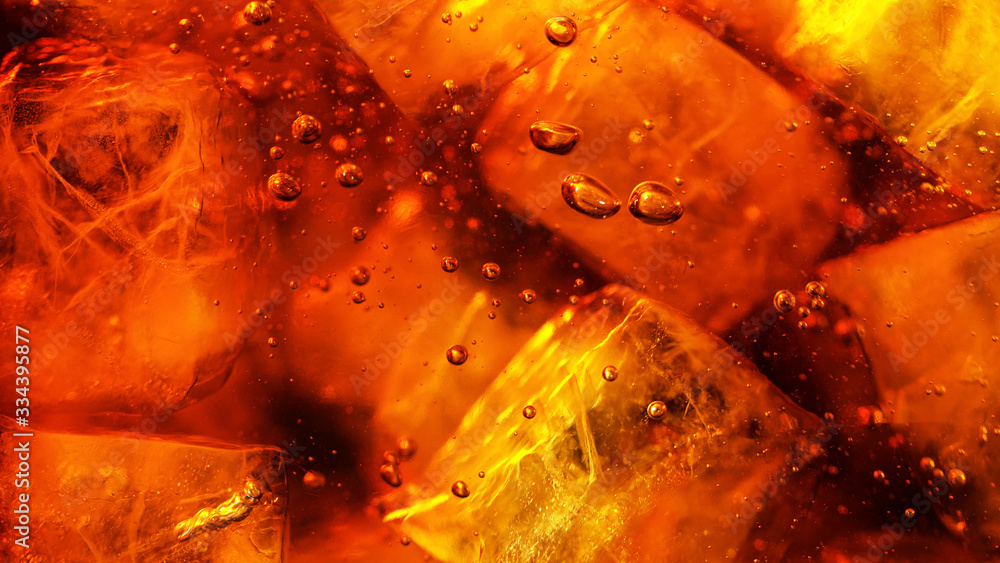 Detail of cola drink with ice cubes