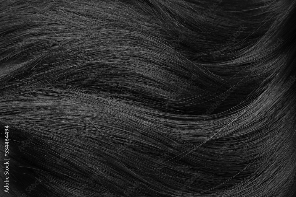 Healthy dark female hair, closeup