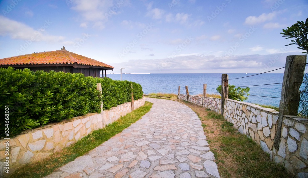 The flagging in seaview garden with sea and horizon background