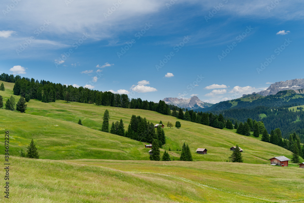 Beautiful scenery of high mountain under the sunny sky; dolomite in Italy 