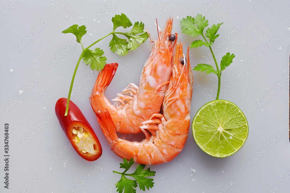 fresh prawn or shrimp on butcher with vegetable