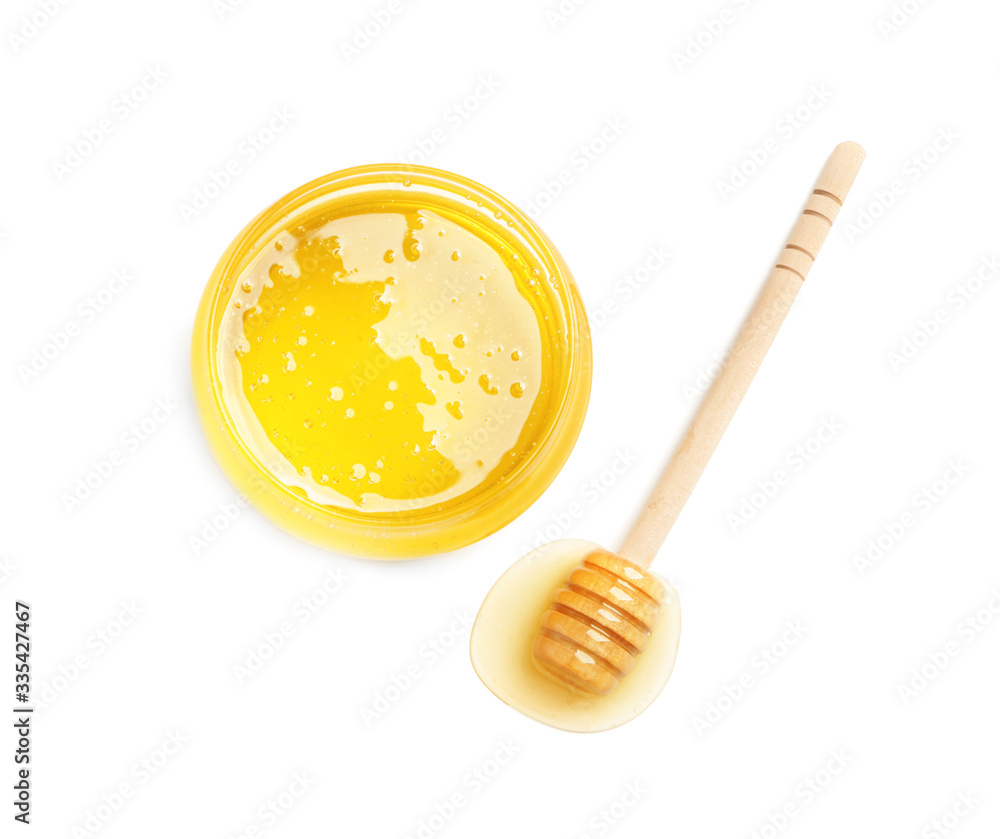 Jar of sweet honey on white background