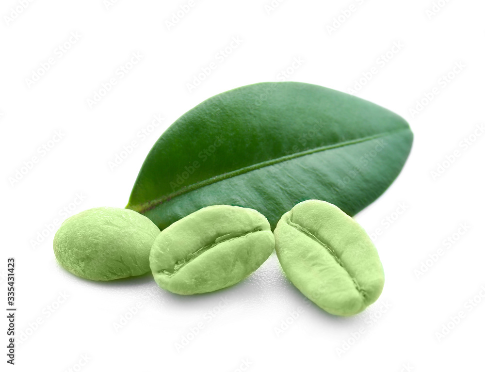 Green coffee beans on white background