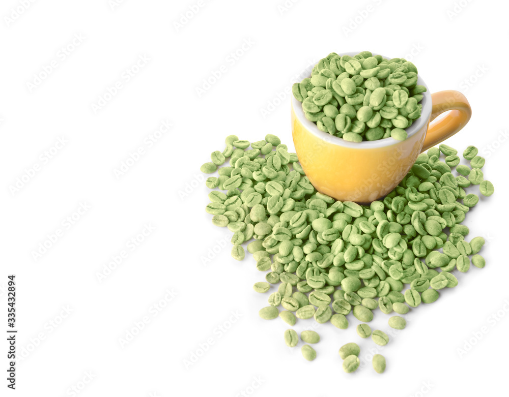 Cup with green coffee beans on white background