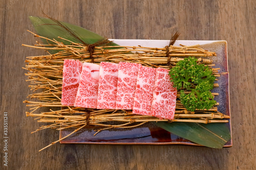 Grade A Japanese wagyu beef on a wooden table