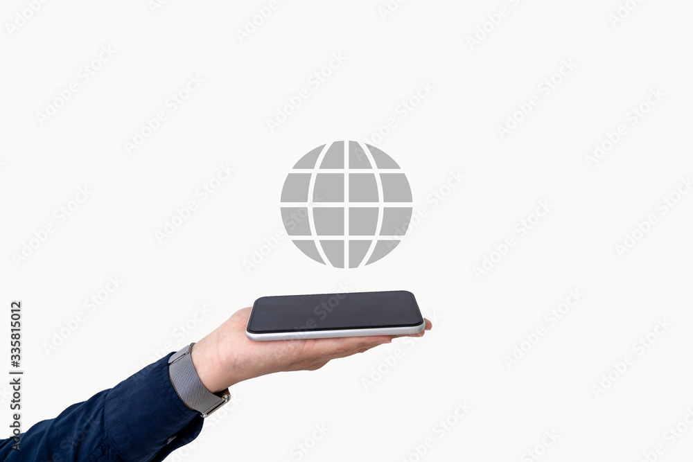 A business person places a mobile phone in the palm of the hand with a globe icon on the top, Wirele