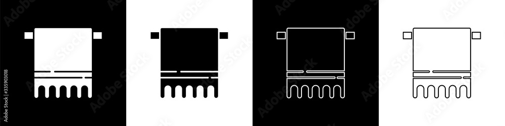 将毛巾放在黑白背景上隔离的衣架图标上。浴室毛巾图标。矢量照明
