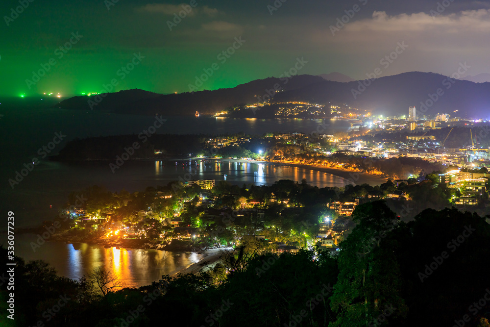 Magnificent scenic view over beautiful Andaman sea and three bays at Karon Viewpoint at night, Phuke