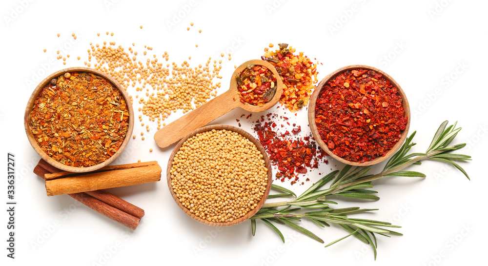 Different spices on white background