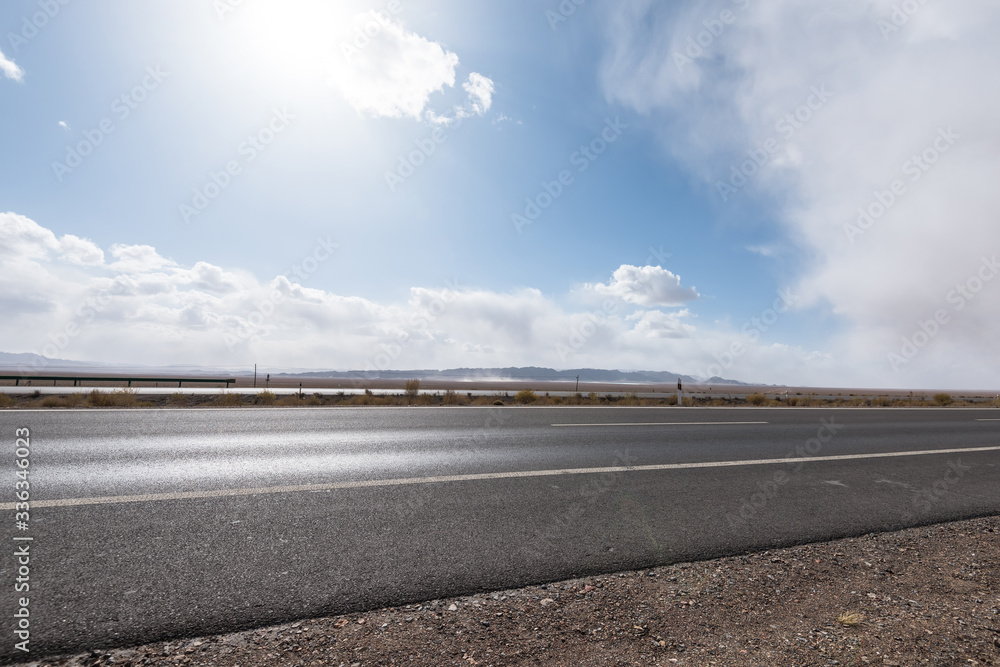 Gobi desert road on vast dry wilderness