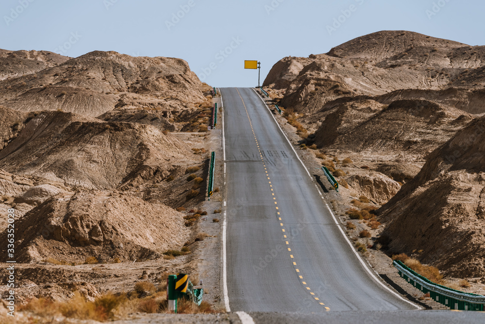 Gobi desert road on vast dry wilderness