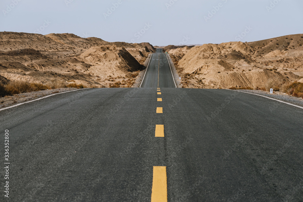 Gobi desert road on vast dry wilderness