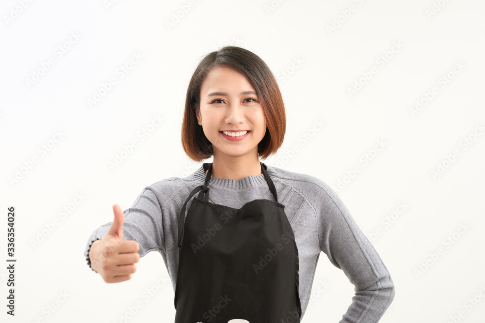 Pretty girl employee rising thumb up and smiling as great services concept with copyspace