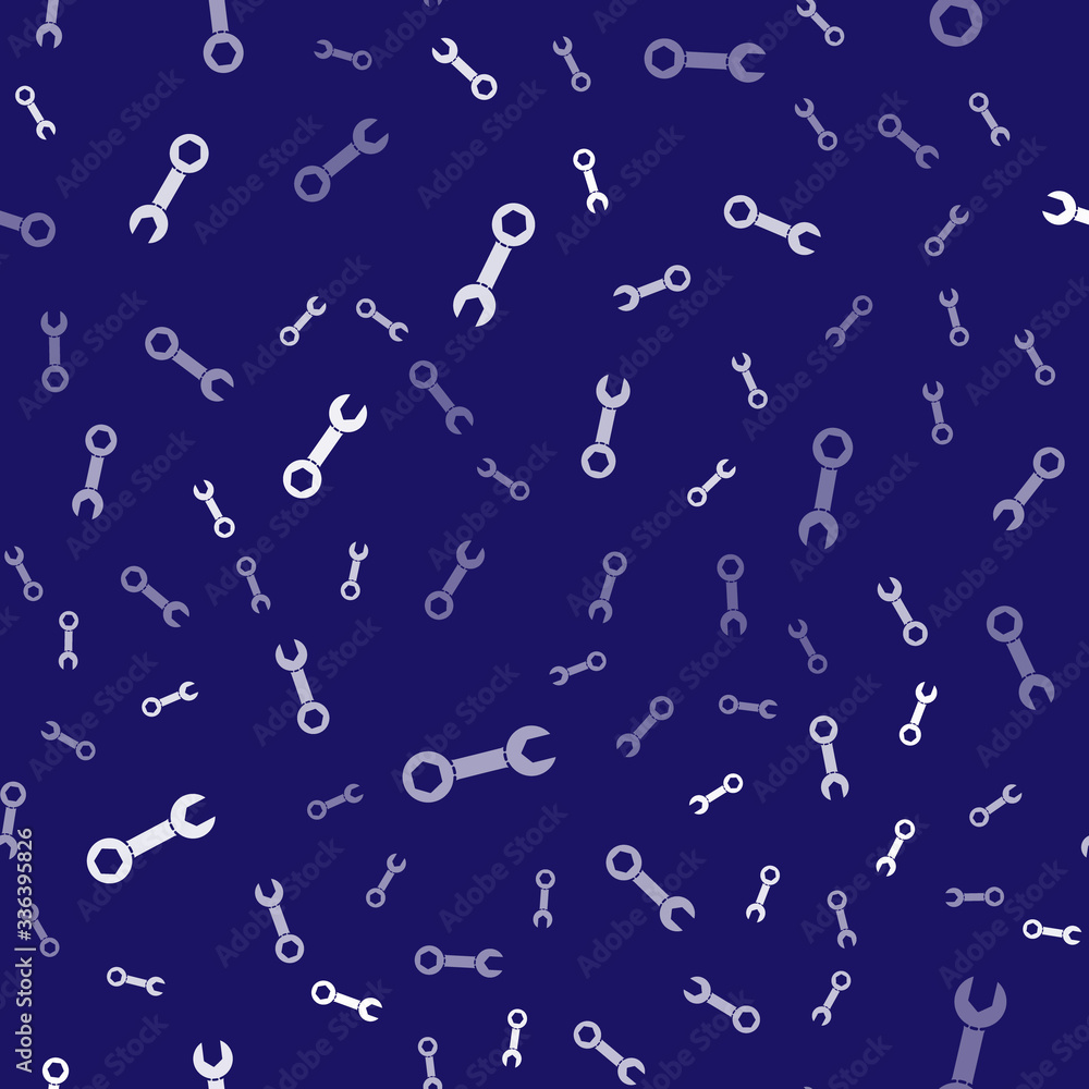 White Wrench spanner icon isolated seamless pattern on blue background. Vector Illustration