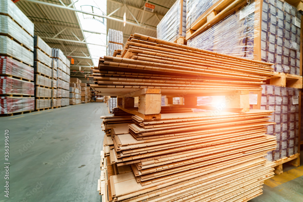 Wooden boards, lumber, industrial wood, timber. Pine wood timber stack of natural rough wooden board