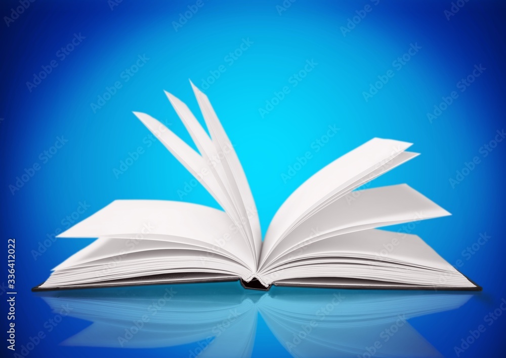 Open study book on blue background