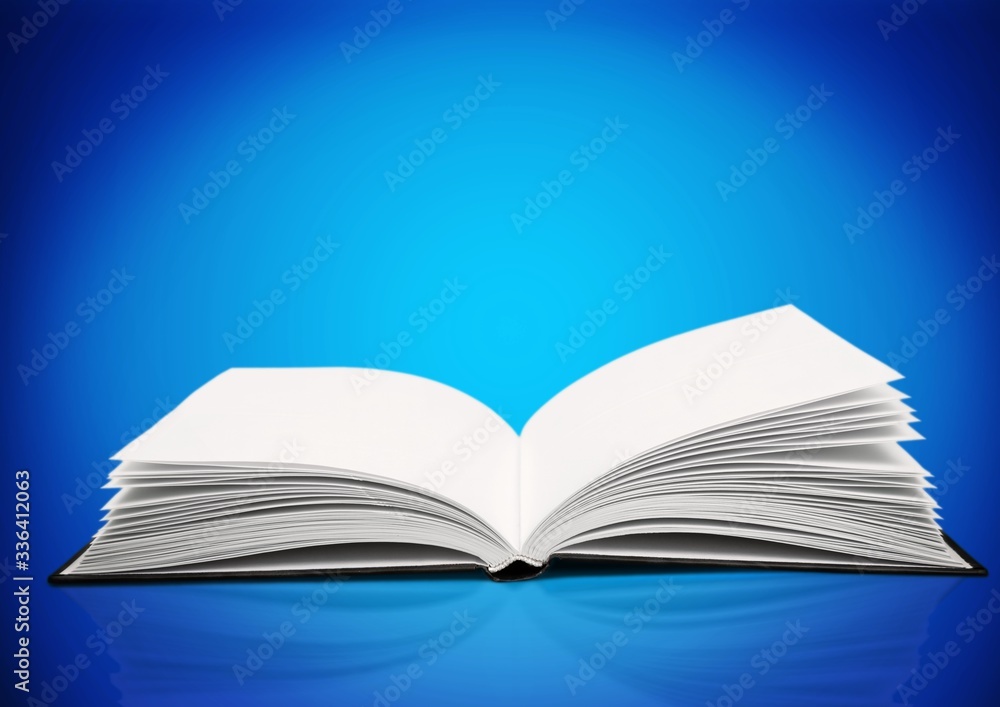 Open study book on blue background