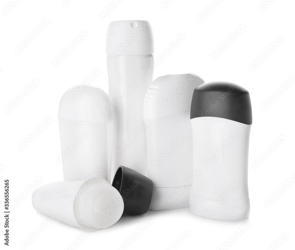 Different deodorants on white background