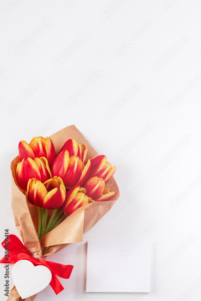 Mothers Day Design Concept, Tulip flower bunch, - Beautiful Red, yellow bouquet isolated on bright 