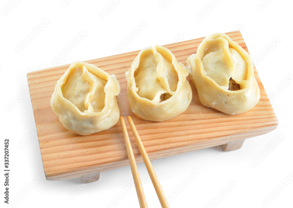 Board with oriental dumplings on white background