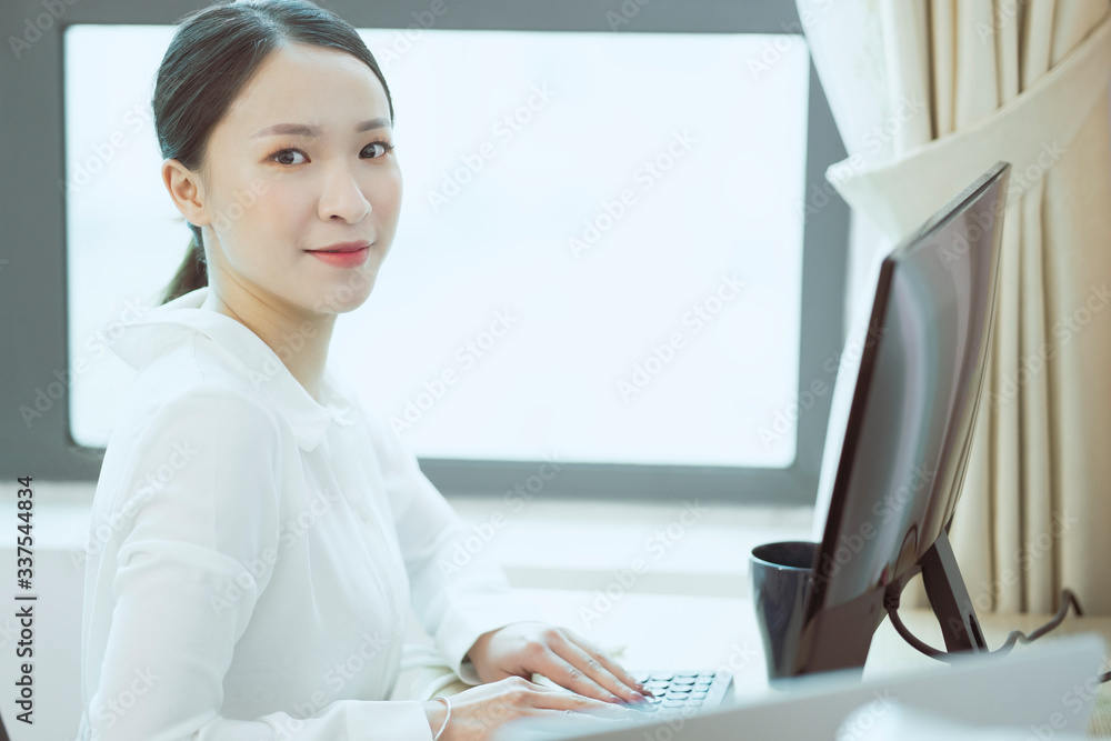 A business woman working in office