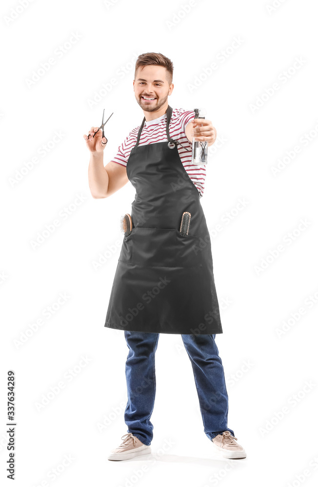 Portrait of male hairdresser on white background