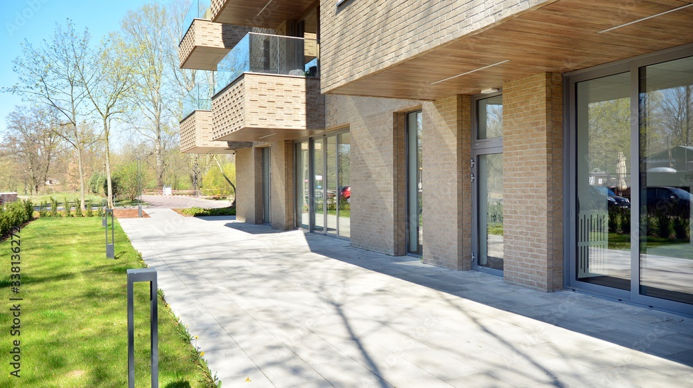 Contemporary residential building exterior in the daylight. Modern apartment buildings on a sunny da