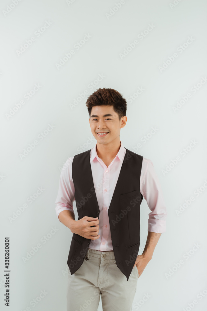 Portrait of young man in office smiling