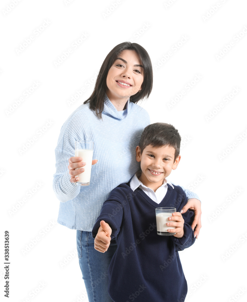 Mother with her little son drinking milk on white background