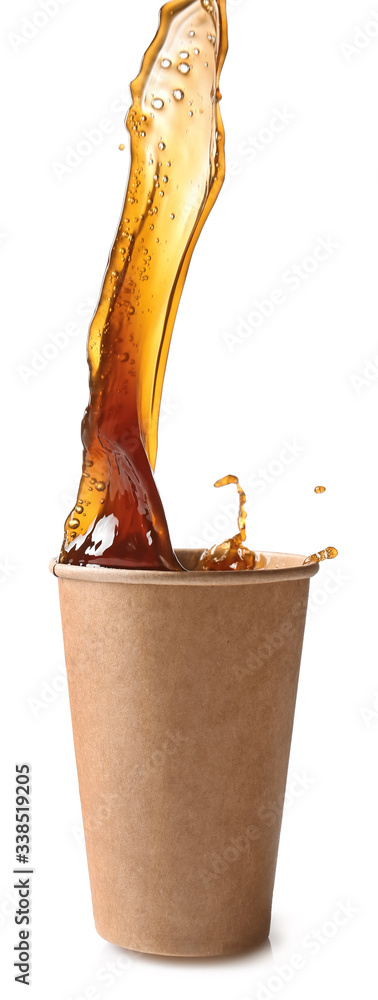 Splashing of coffee in cup on white background