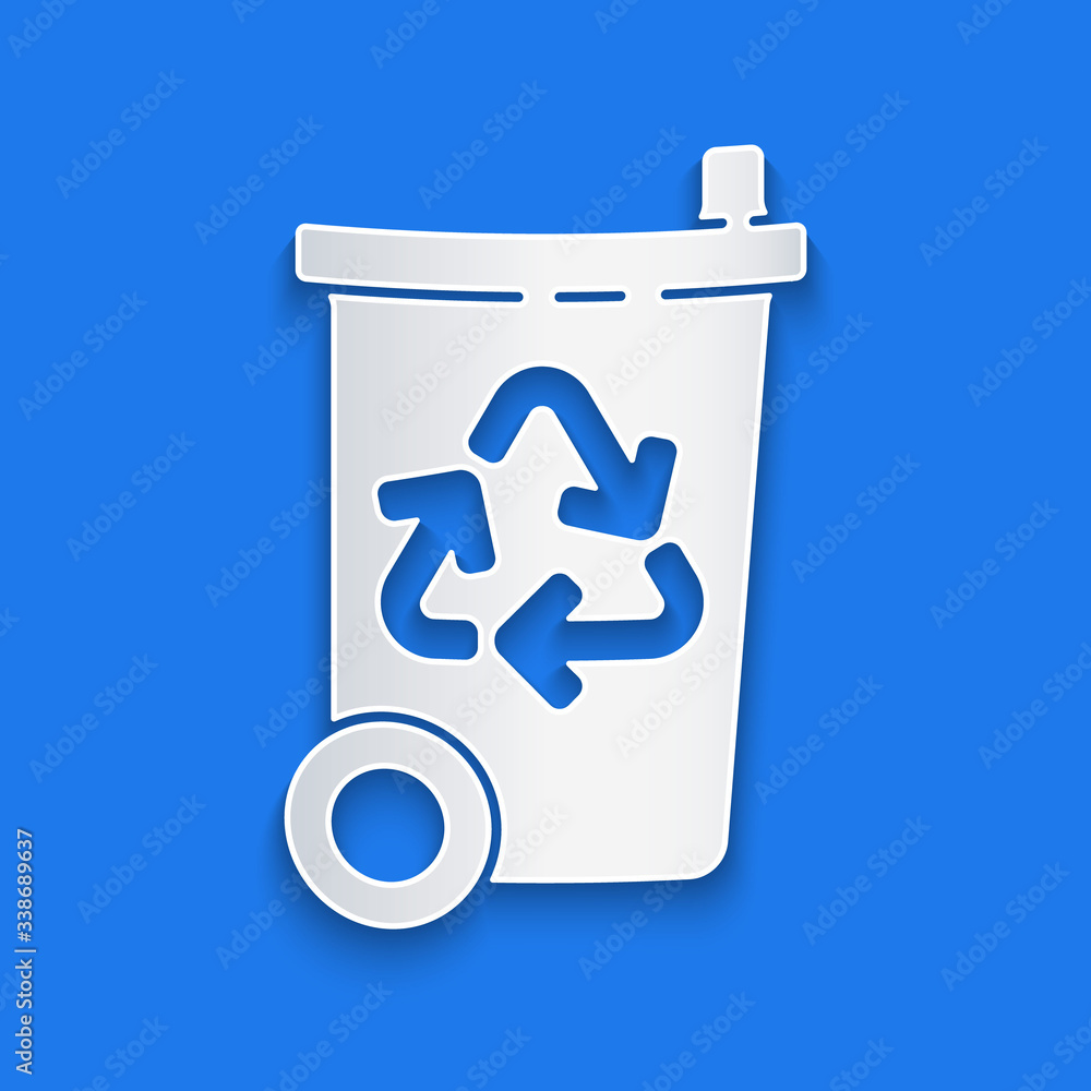 Paper cut Recycle bin with recycle symbol icon isolated on blue background. Trash can icon. Garbage 