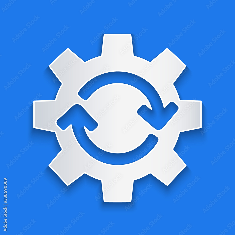 Paper cut Gear and arrows as workflow concept icon isolated on blue background. Gear reload sign. Pa