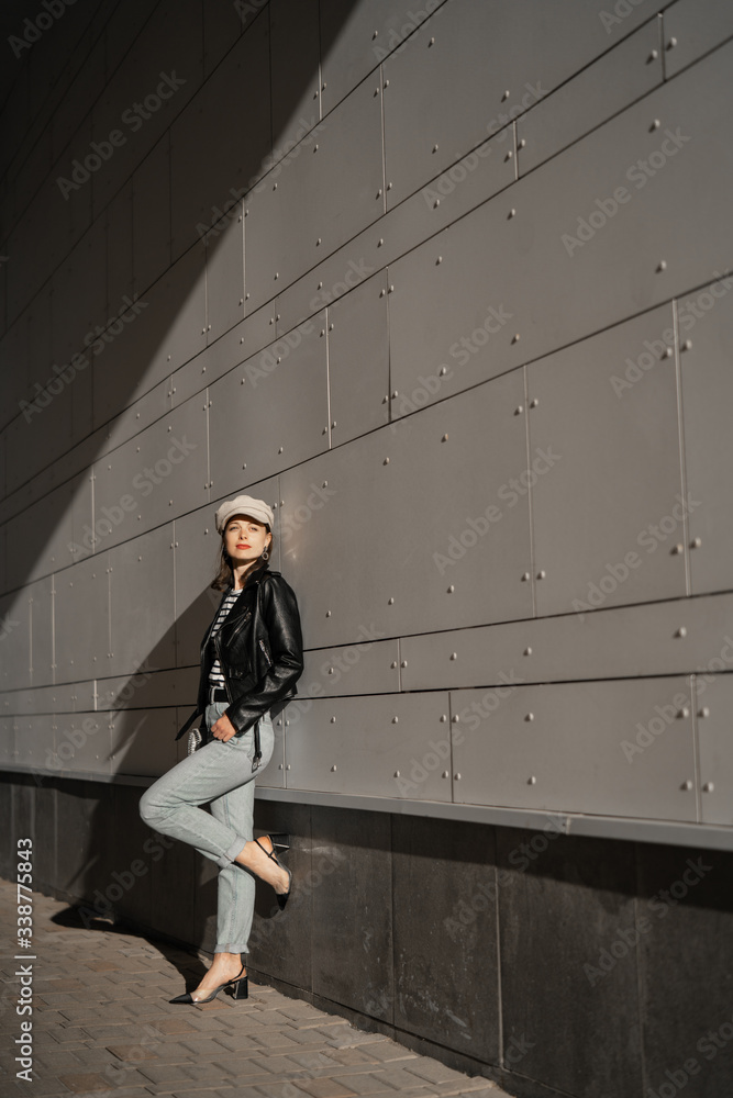 Attractive woman at the wall