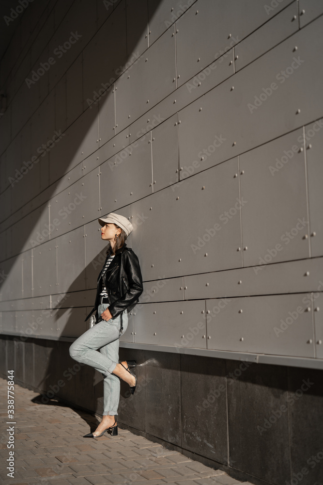 Young stylish woman outdoors