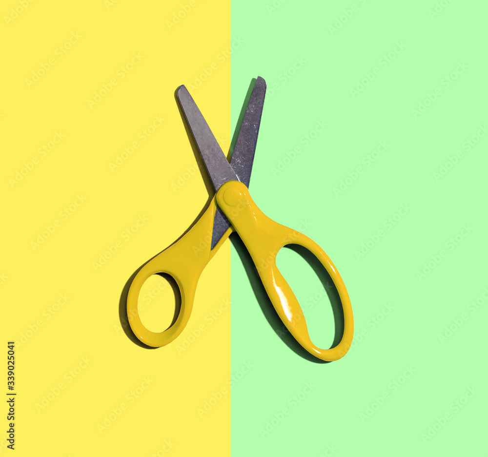 Scissors with dropped shadow from above - overhead view