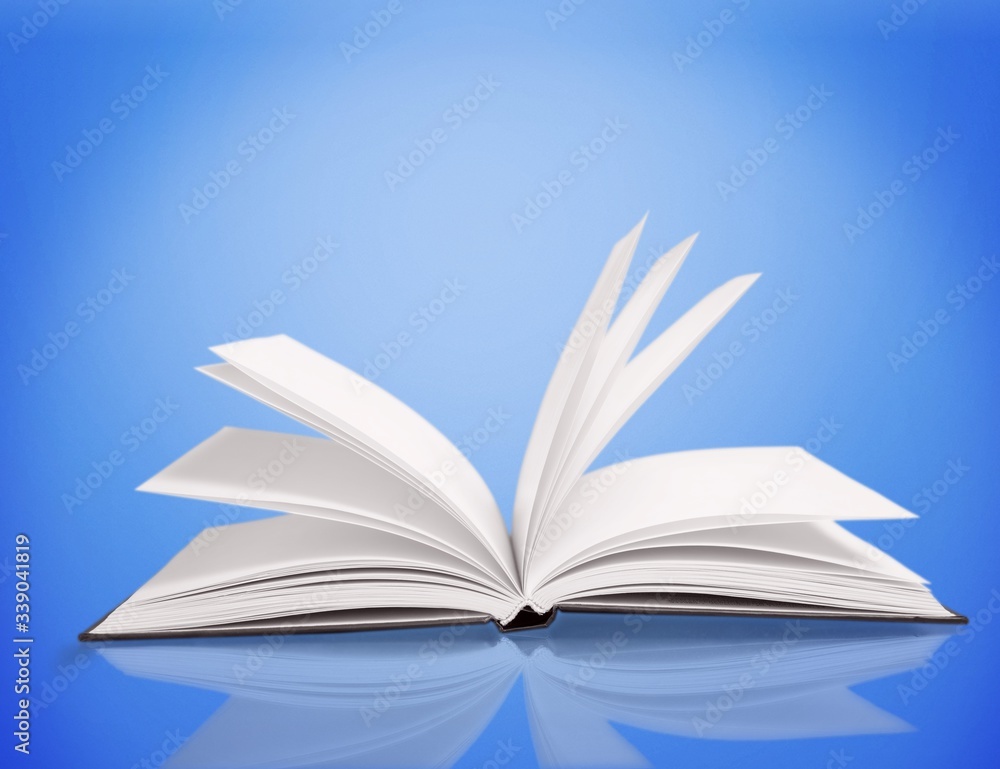 Open study book on blue background