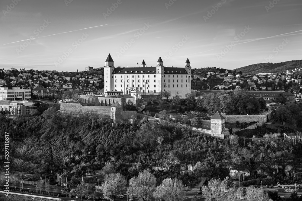 Bratislava castle over Danube river after sunset in the Bratislava old town, Slovakia