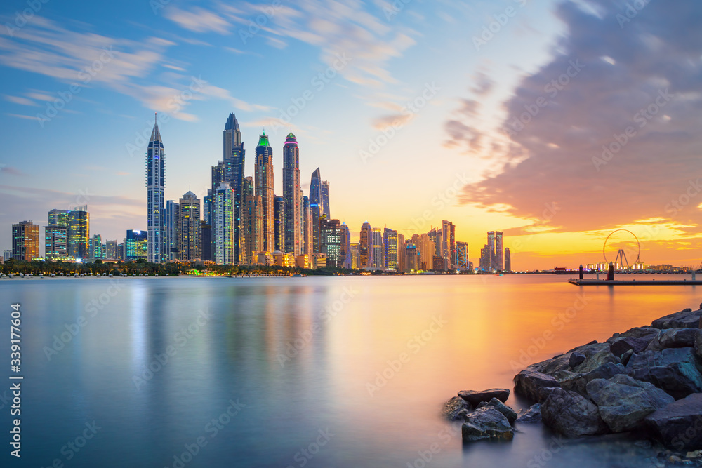 Dubai Marina, city of tourism from Palm Island at sunrise, United Arab Emirates