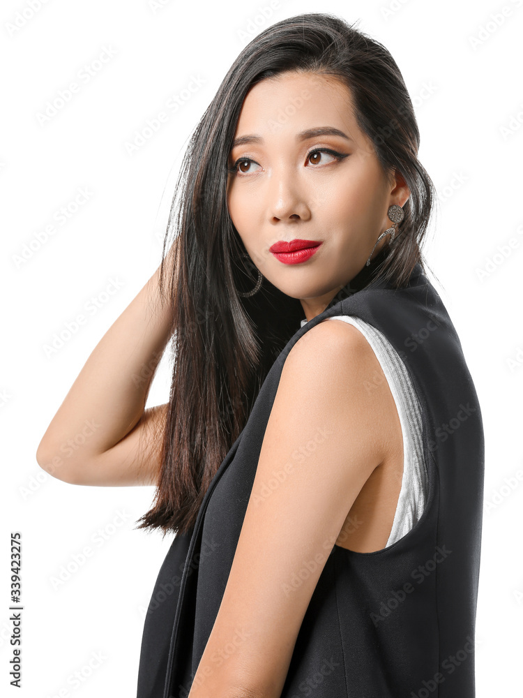 Young Asian woman with beautiful hair on white background