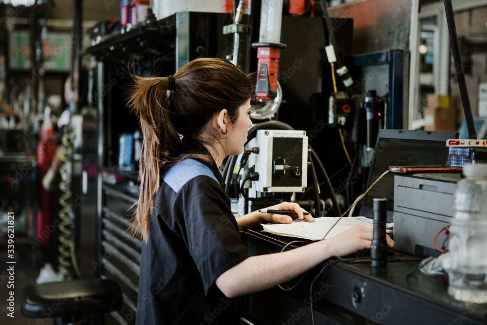 Female electrician at work