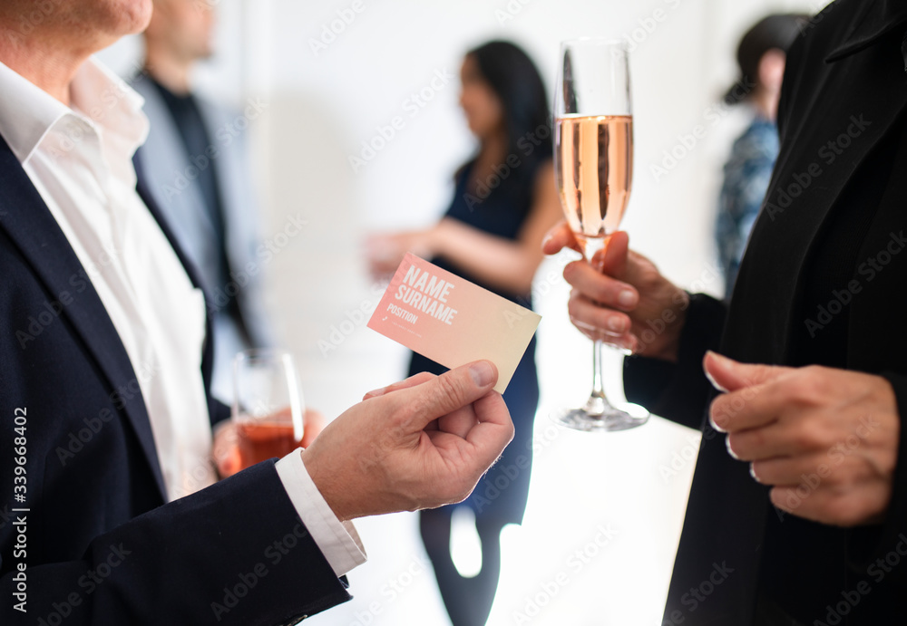 Businessman handing over businesscard